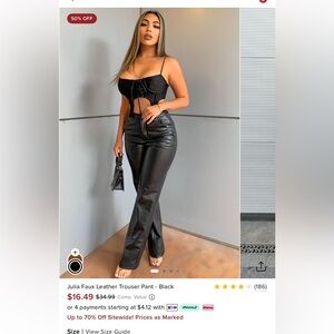 Fashionova black leather pants.